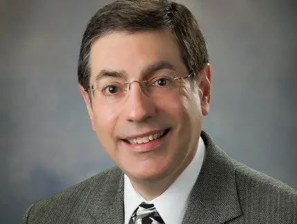 Dr. Aiman Hassan - Premier Urgent Care Clinic Medical Professional