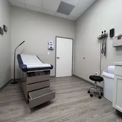 Medical professional conducting a physical exam